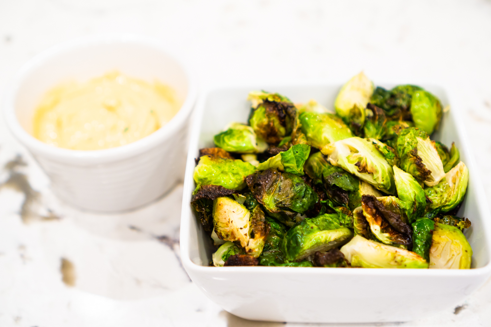 CRISPY BRUSSELS SPROUTS WITH A CHIPOTLE LIME GARLIC AIOLI